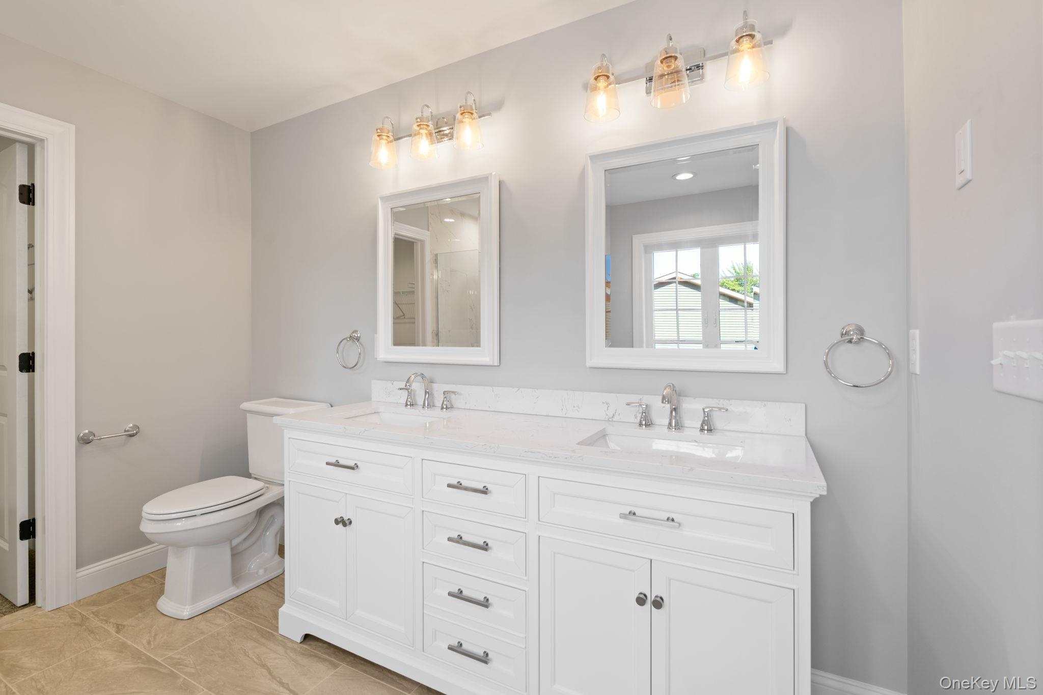 61 Smith Avenue Walden, NY 12586 - Photo 18 of 42 a bathroom with a toilet sink and mirror