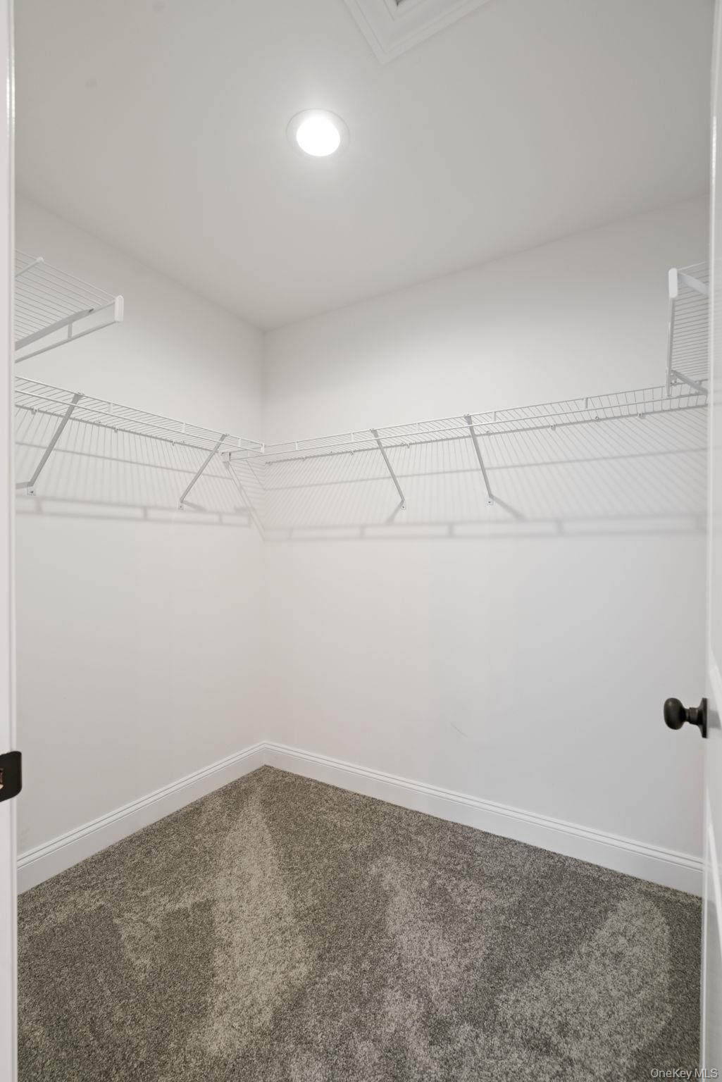 61 Smith Avenue Walden, NY 12586 - Photo 21 of 42 a view of a room with racks on the wall