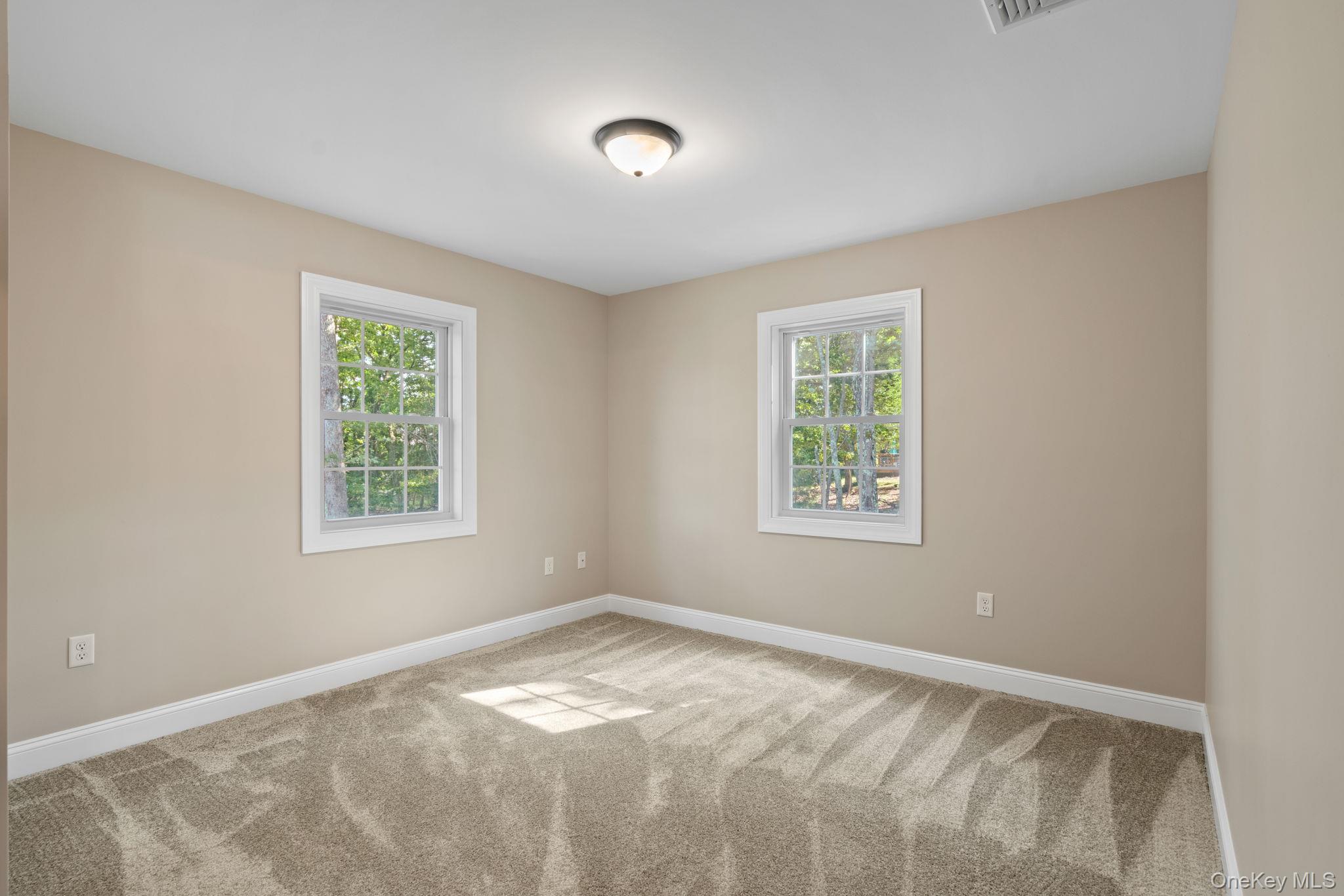 61 Smith Avenue Walden, NY 12586 - Photo 22 of 42 a view of a bedroom with a window