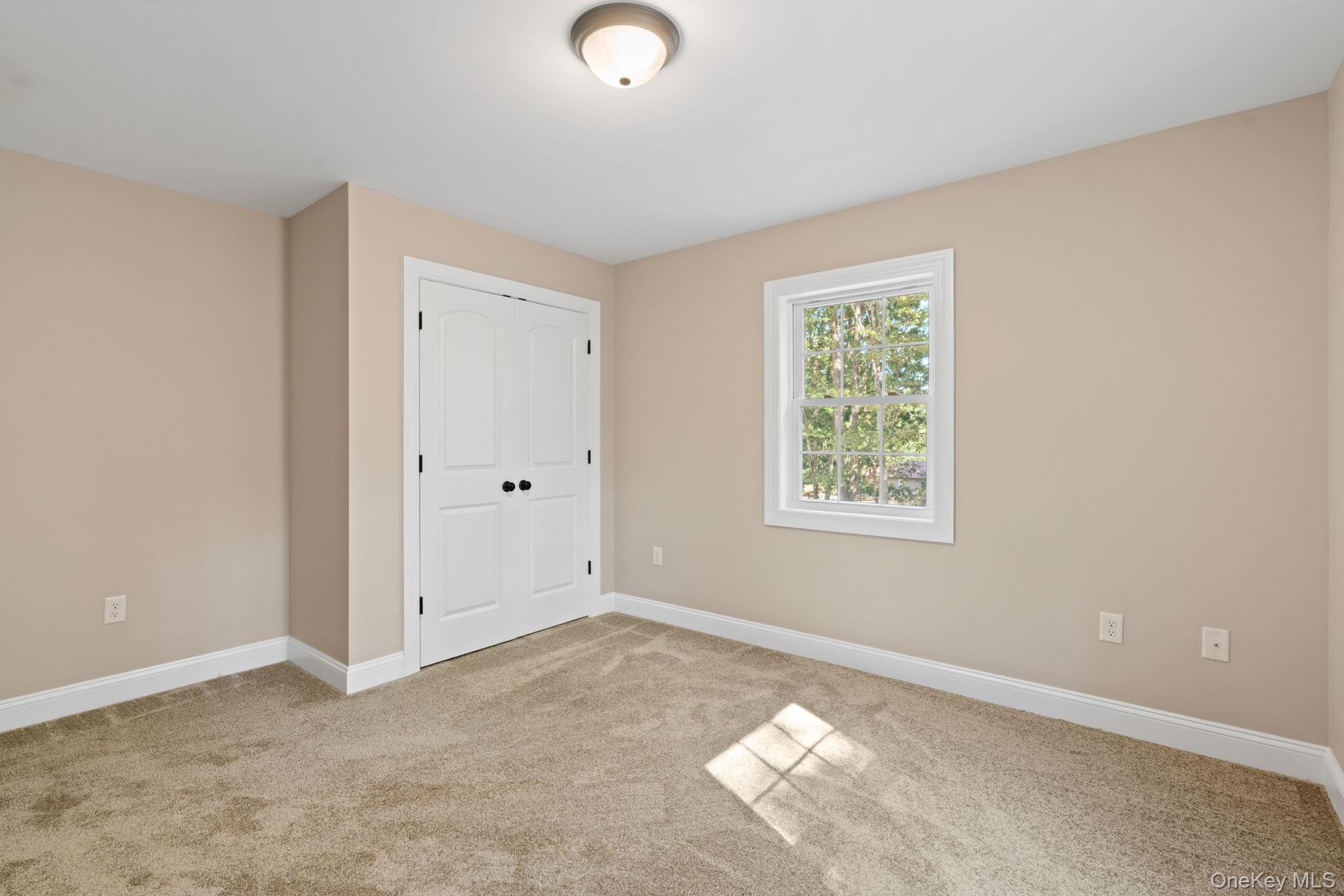61 Smith Avenue Walden, NY 12586 - Photo 23 of 42 a view of an empty room with a window