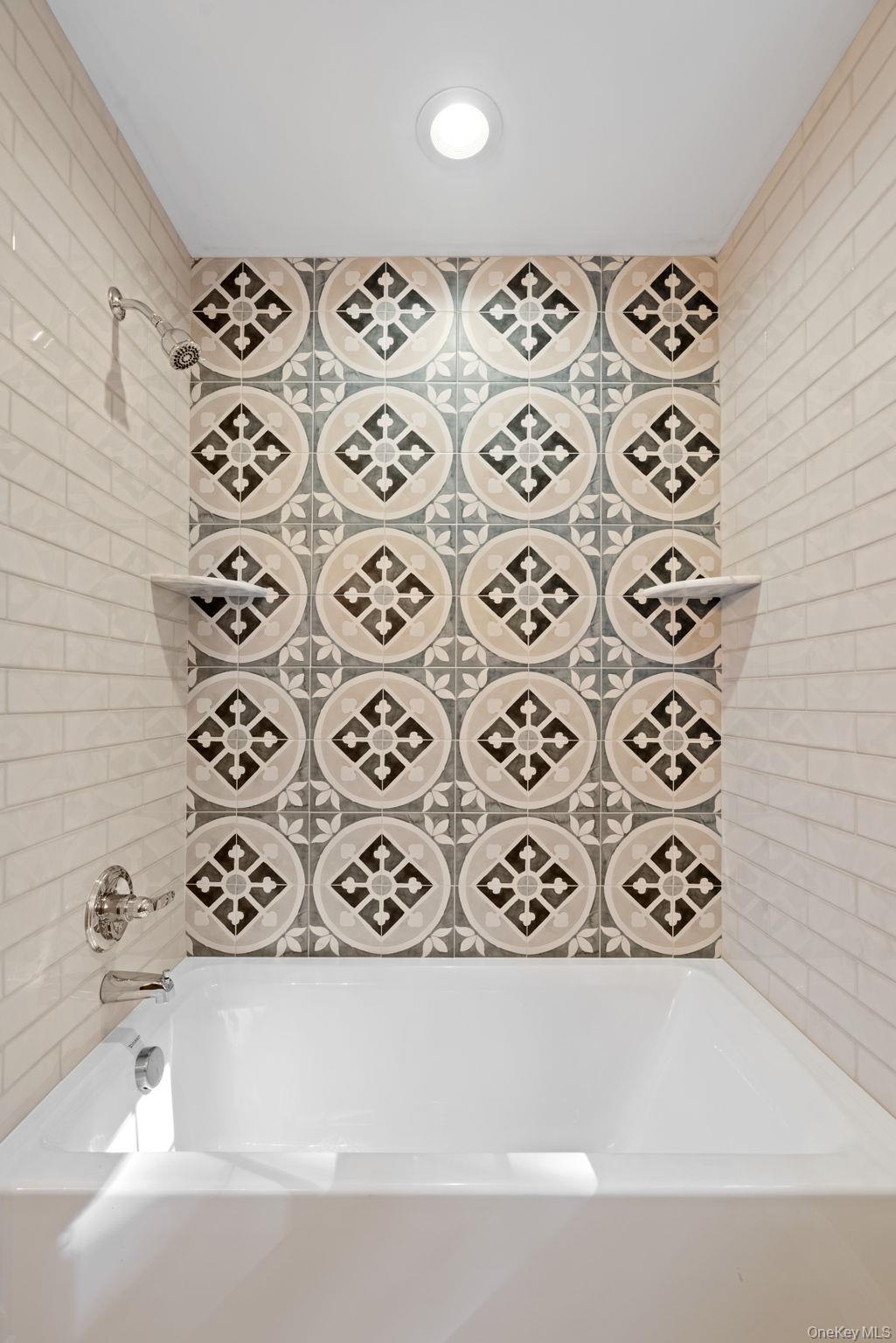 61 Smith Avenue Walden, NY 12586 - Photo 26 of 42 a bathroom with a bathtub and next to a sink