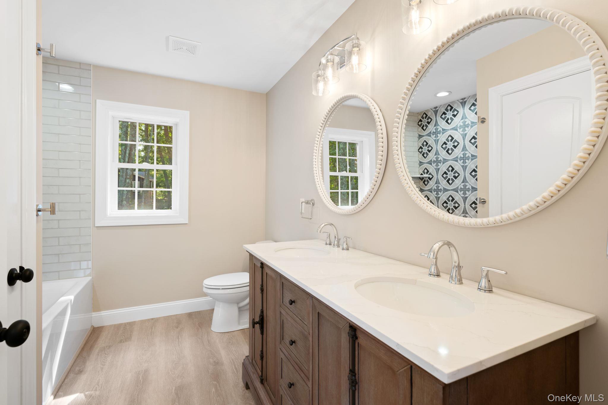 61 Smith Avenue Walden, NY 12586 - Photo 27 of 42 a bathroom with a sink and a mirror