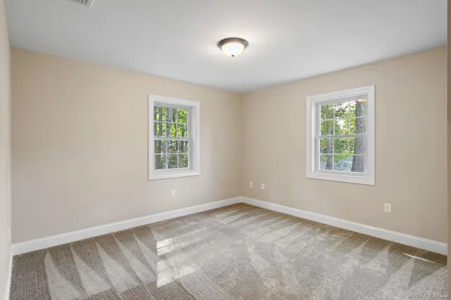 a bathroom with a bathtub and next to a sink