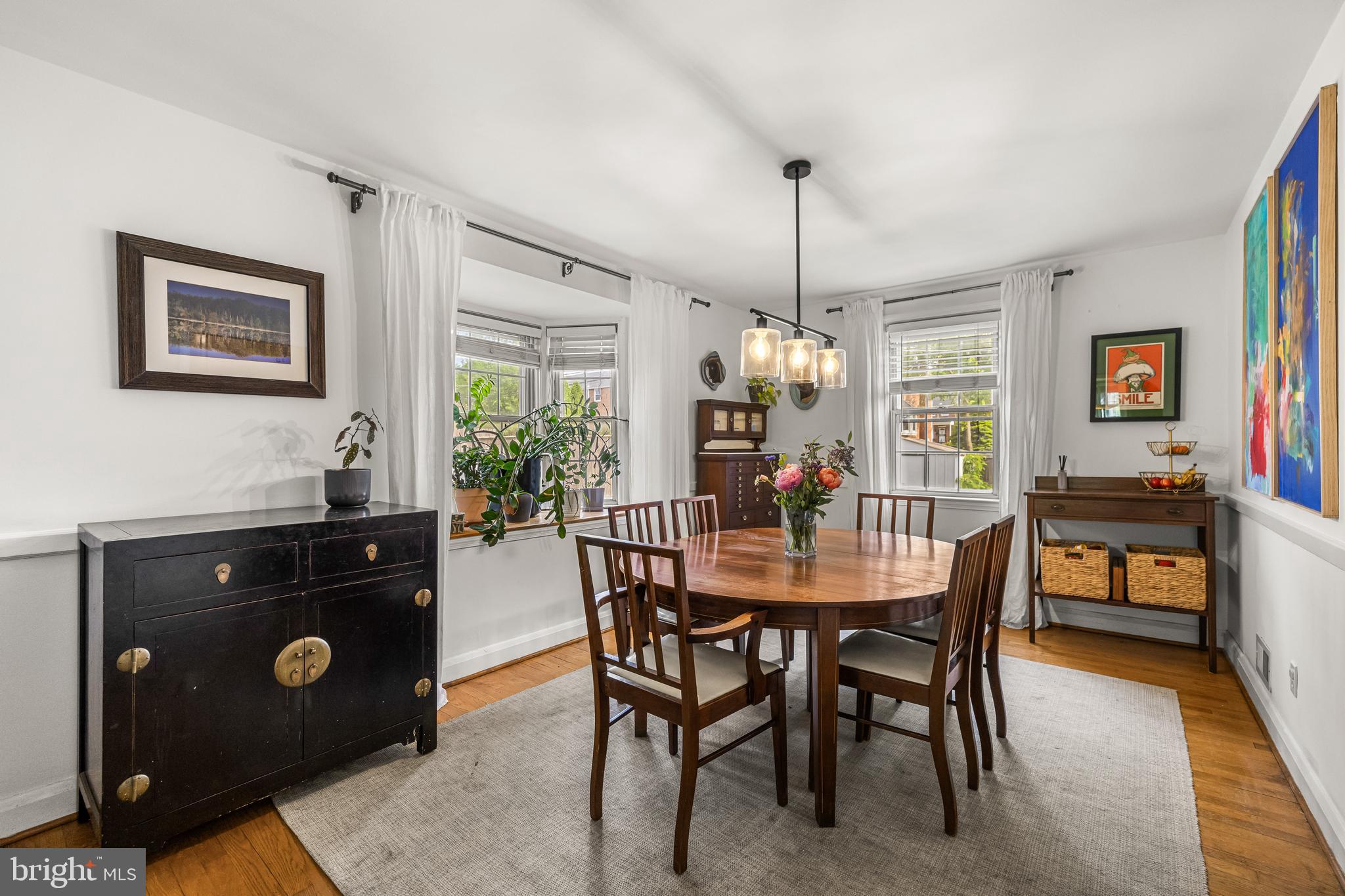 1620 Hardwick Road Towson, MD 21286 - Photo 8 of 38 a dining room with a wooden table and chairs