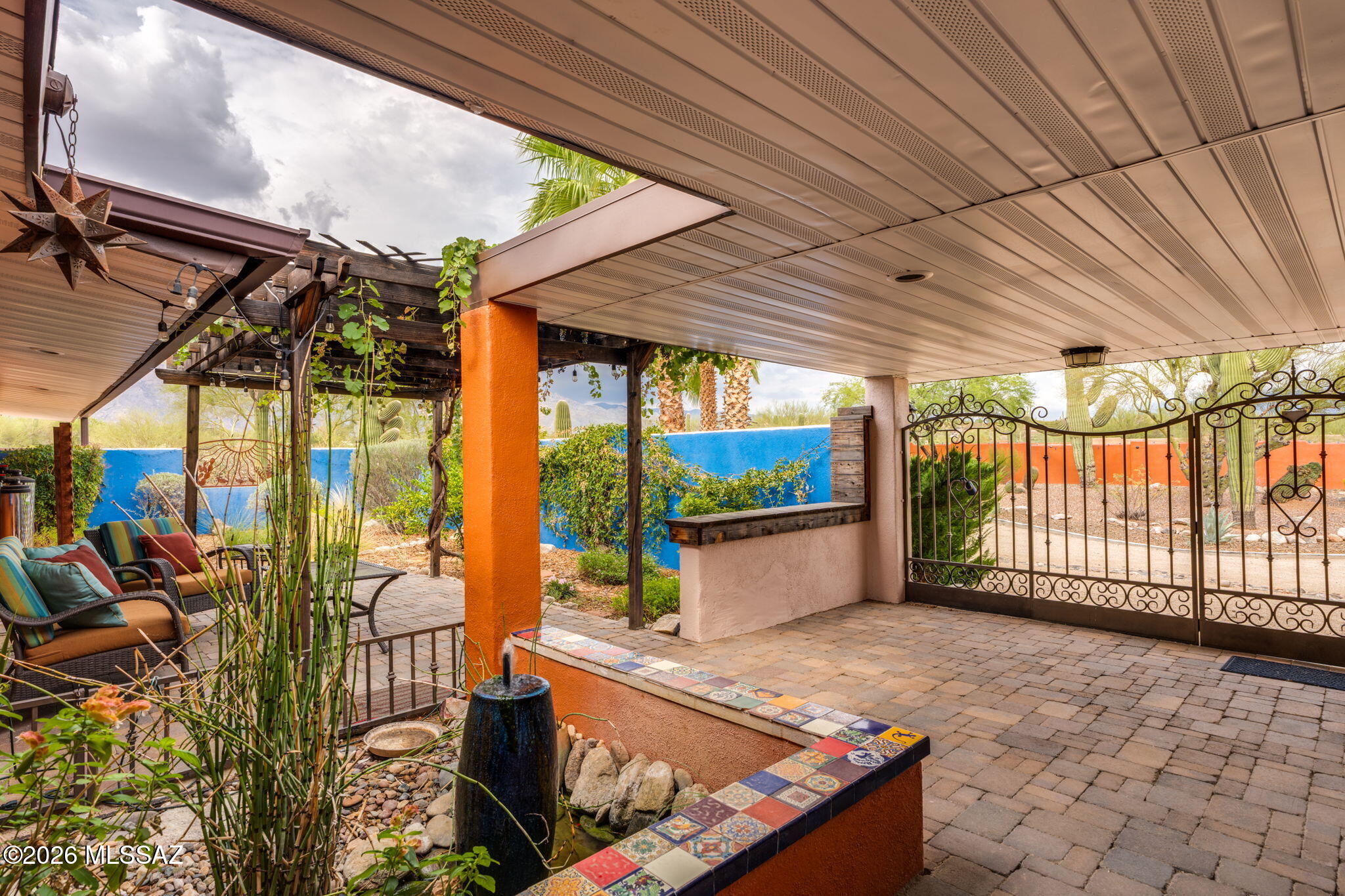 4425 North Pontatoc Road Tucson, AZ 85718 - Photo 6 of 47 Fountain and gate on front courtyard