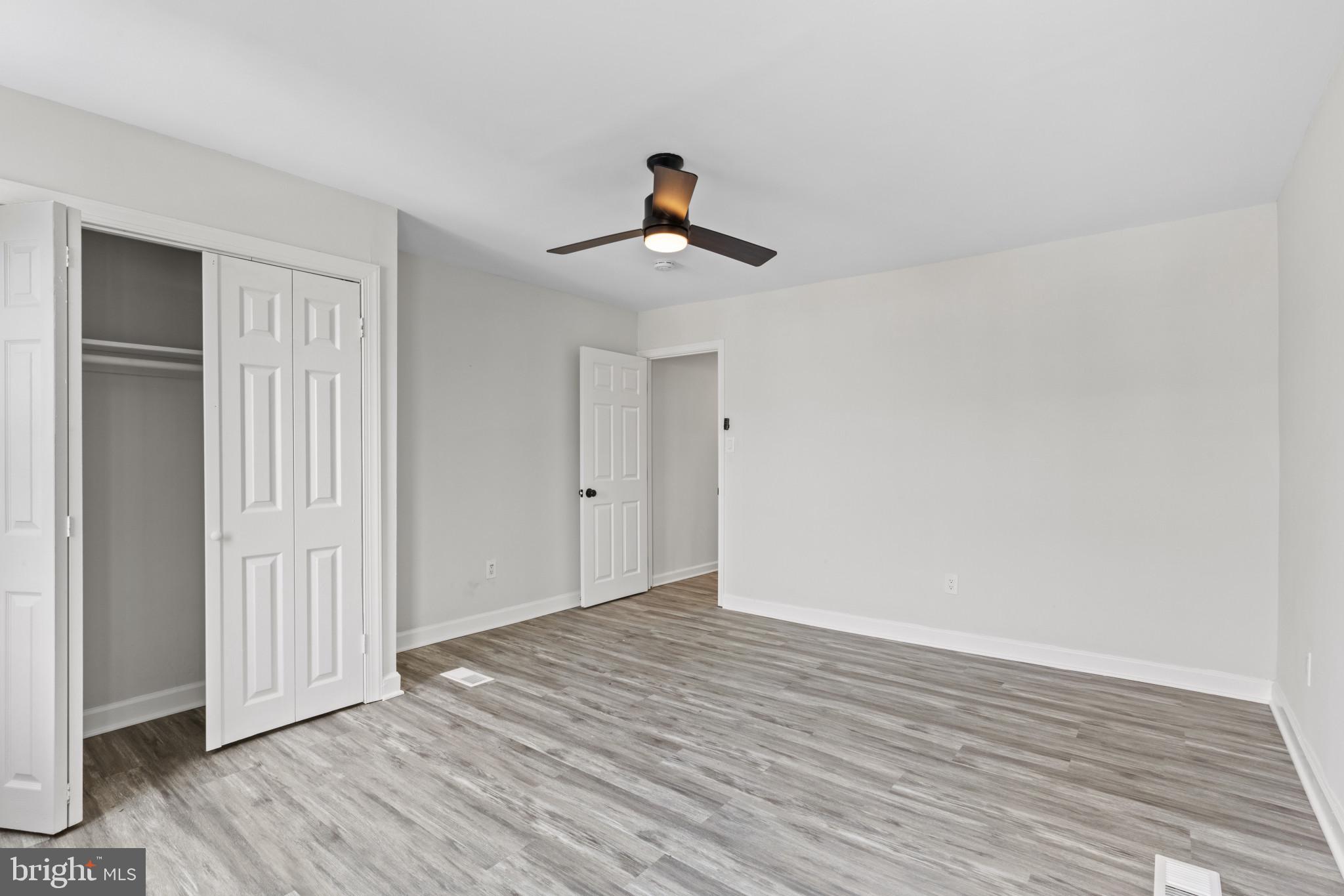 3404 East Pratt Street Baltimore, MD 21224 - Photo 32 of 39 a view of a room with wooden floor