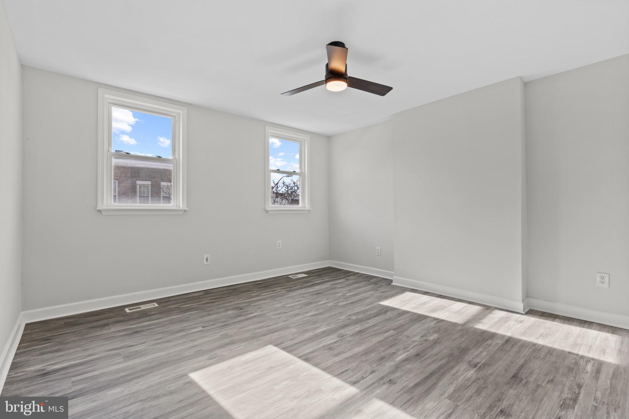3404 East Pratt Street Baltimore, MD 21224 - Photo 35 of 39 a view of empty room with wooden floor