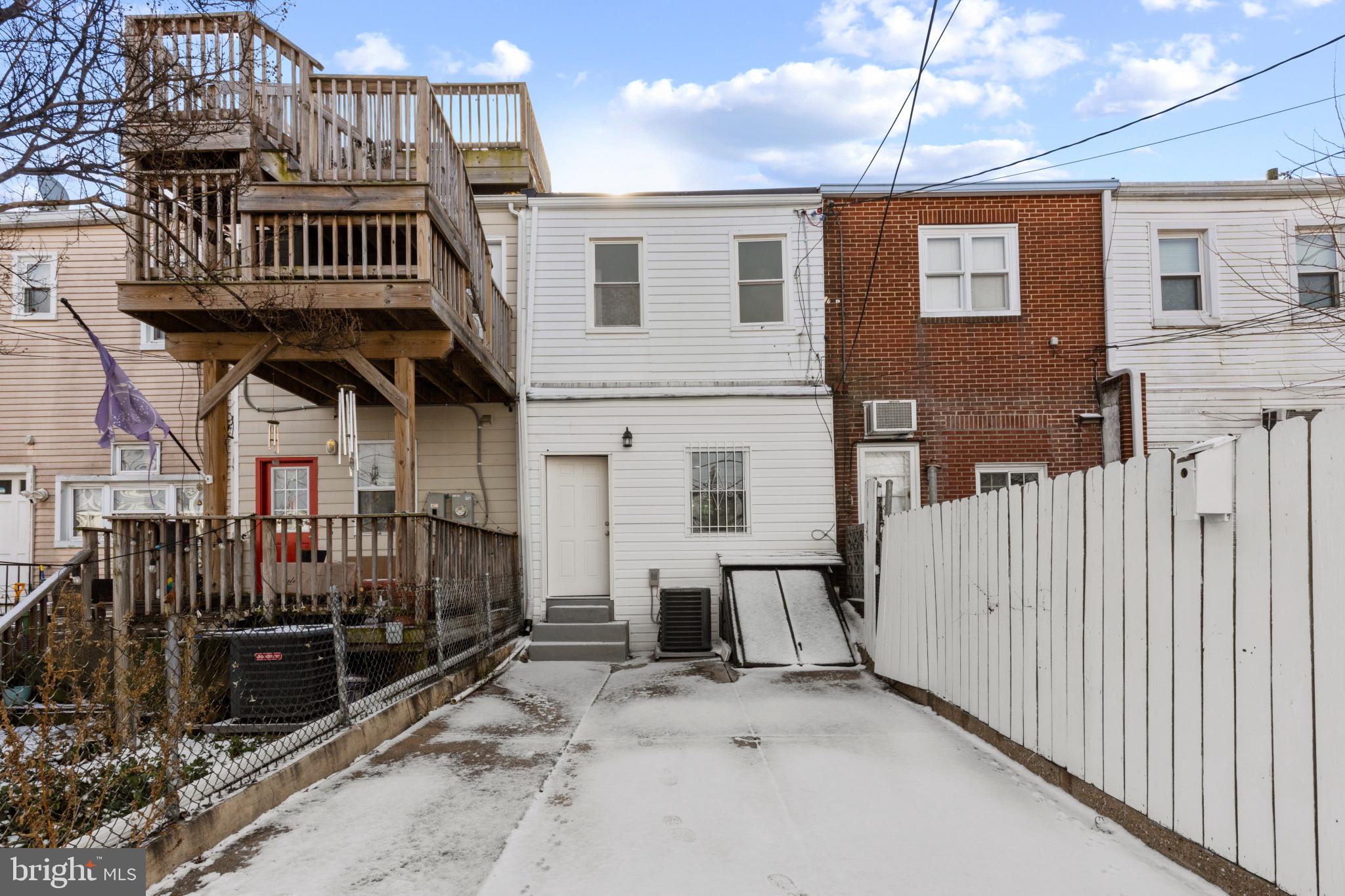 3404 East Pratt Street Baltimore, MD 21224 - Photo 37 of 39 a view of a house with wooden deck