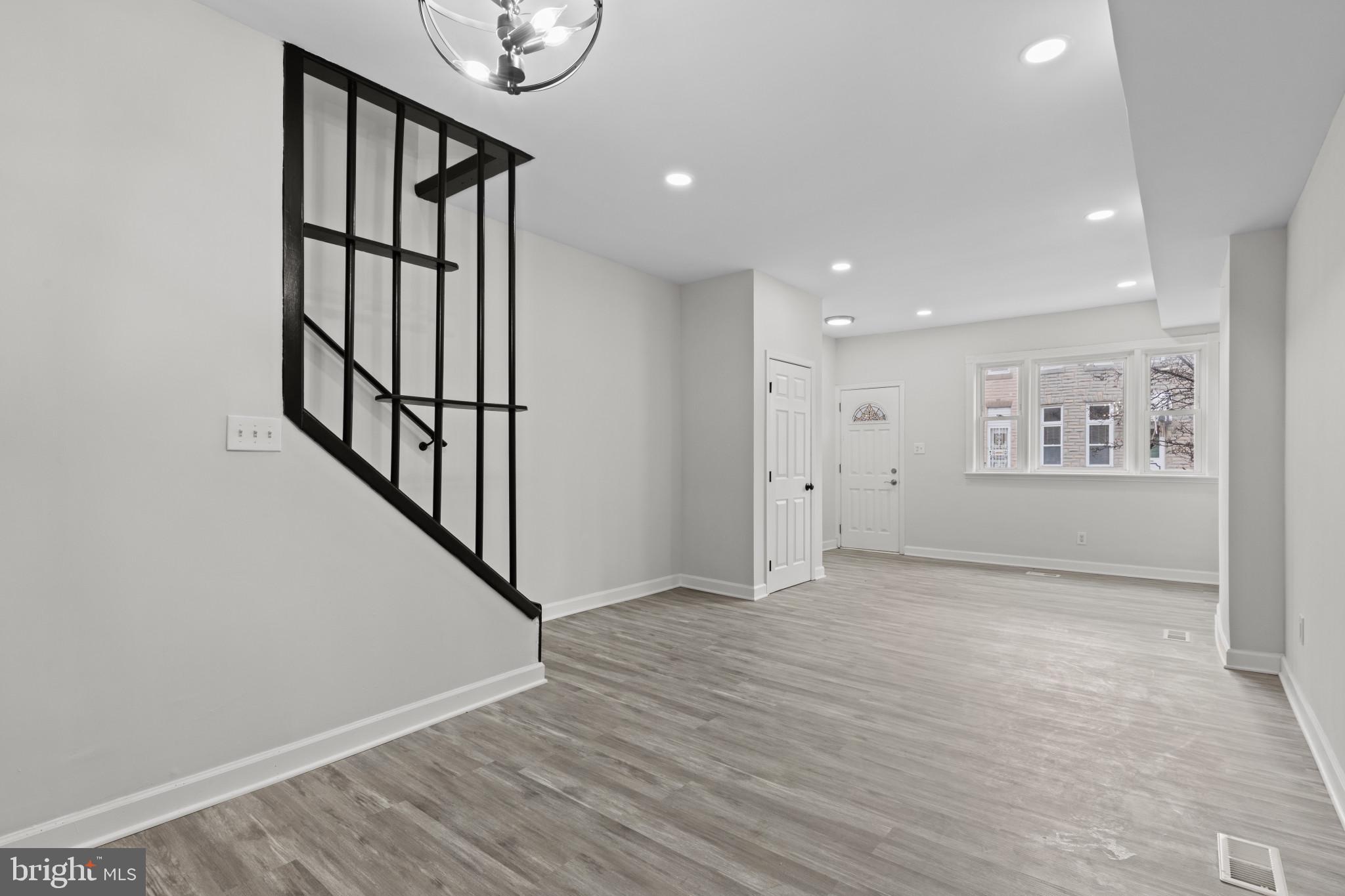 3404 East Pratt Street Baltimore, MD 21224 - Photo 10 of 39 a view of an entryway with wooden floor
