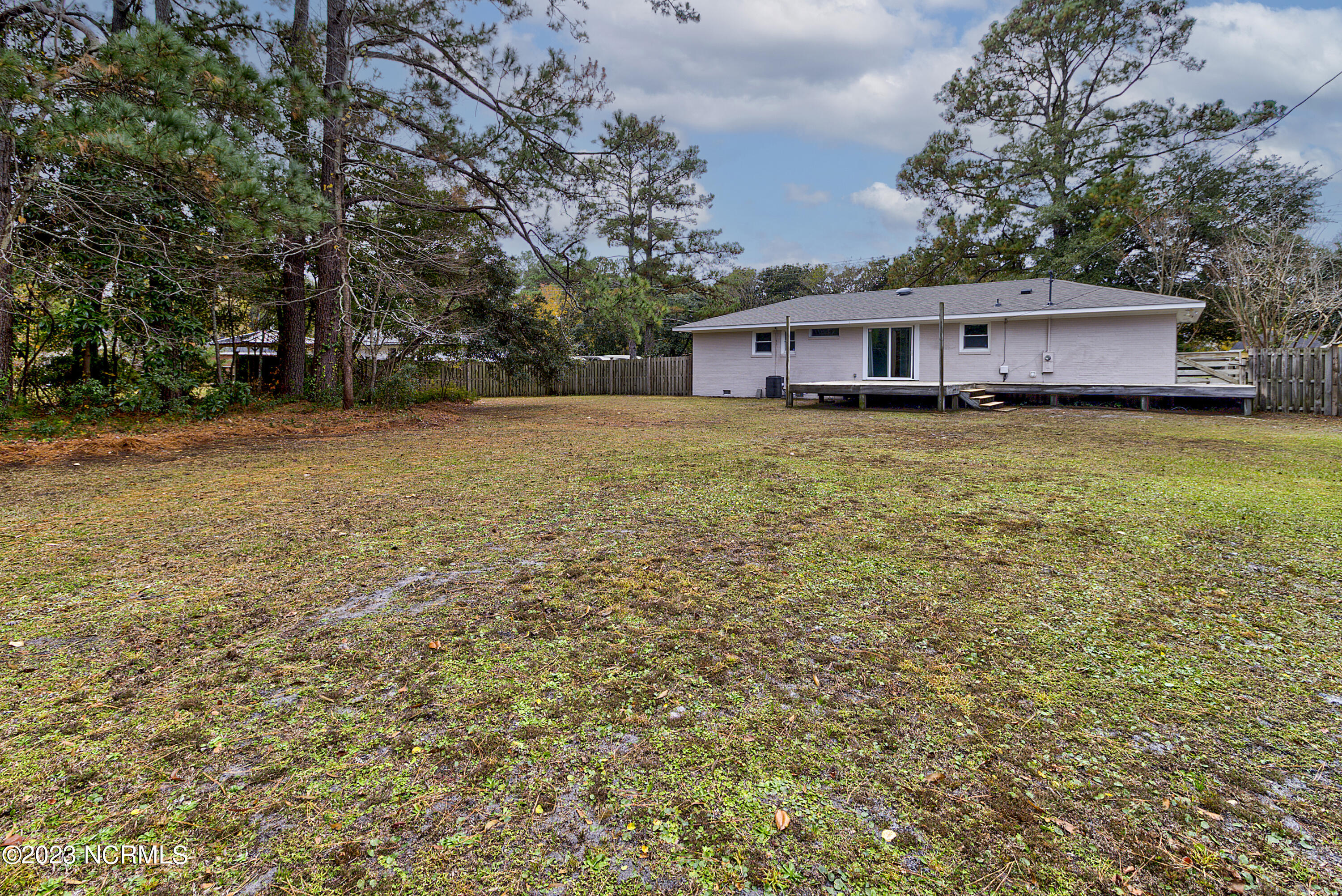 6632 Greenville Loop Road Wilmington, NC 28409 - Photo 2 of 33 Fenced Backyard