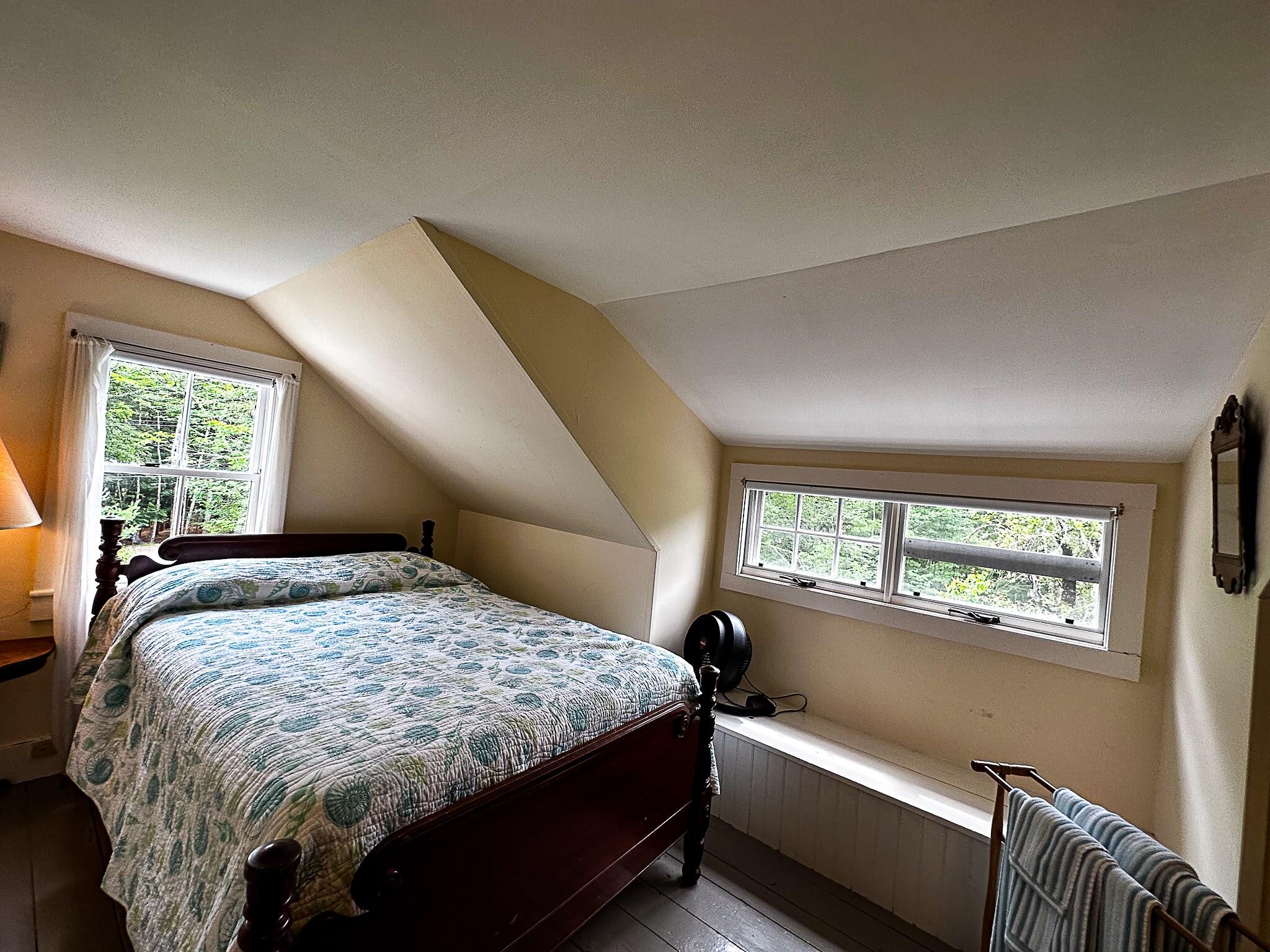 1319 Newbury Neck Road Surry, ME 04684 - Photo 36 of 68 2nd bedroom with built-in seat.