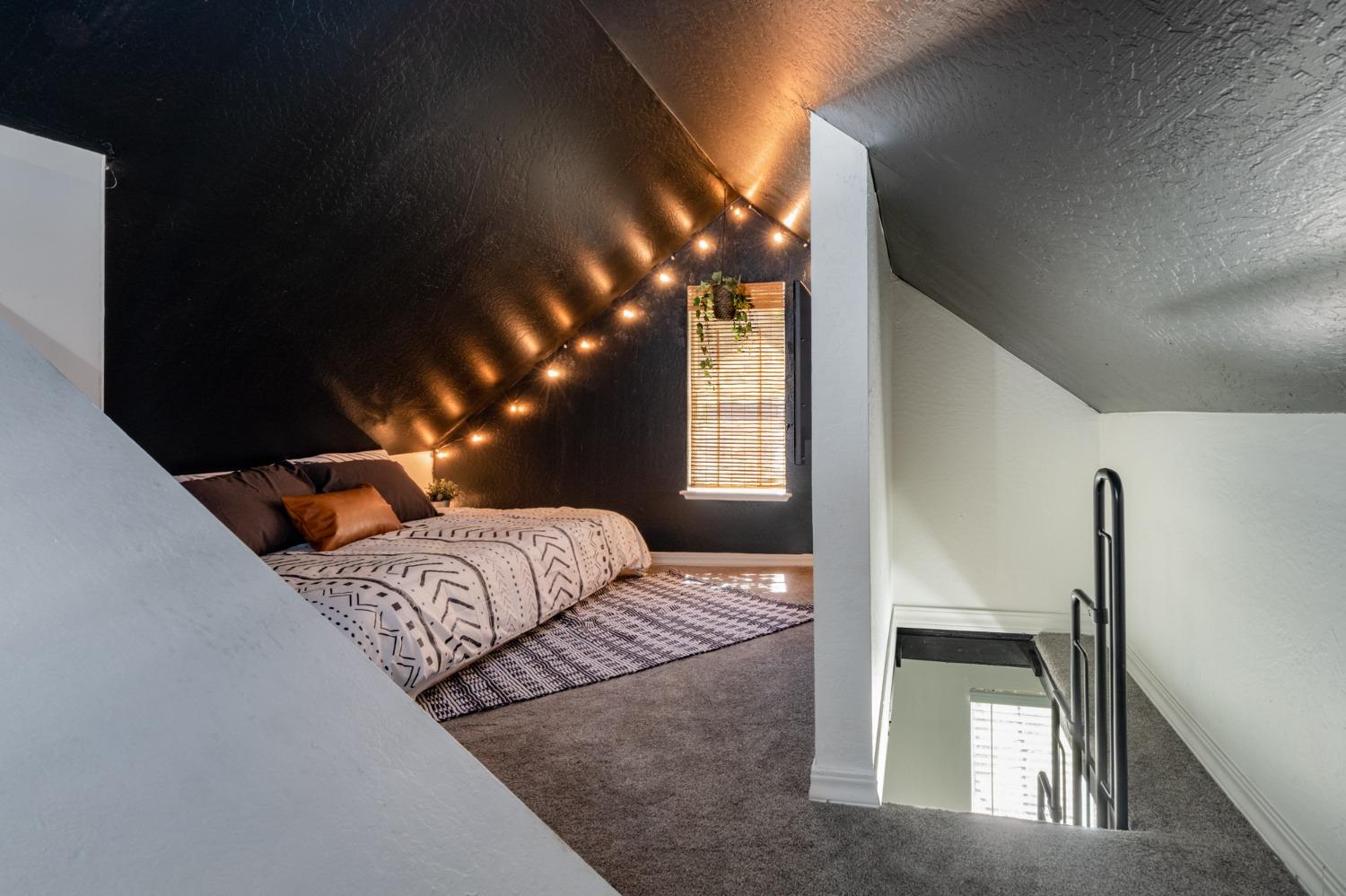 25941 Ellmaro Road Long Barn, CA 95335 - Photo 22 of 74 a bedroom with a bed and window