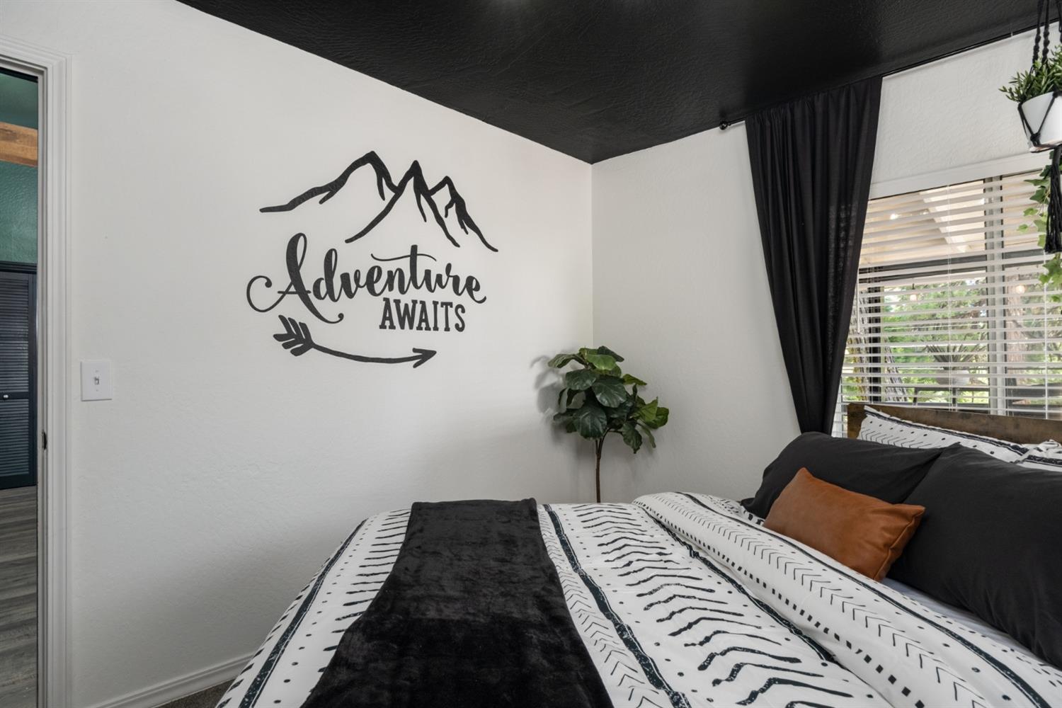 25941 Ellmaro Road Long Barn, CA 95335 - Photo 24 of 74 a bedroom with bed and a window