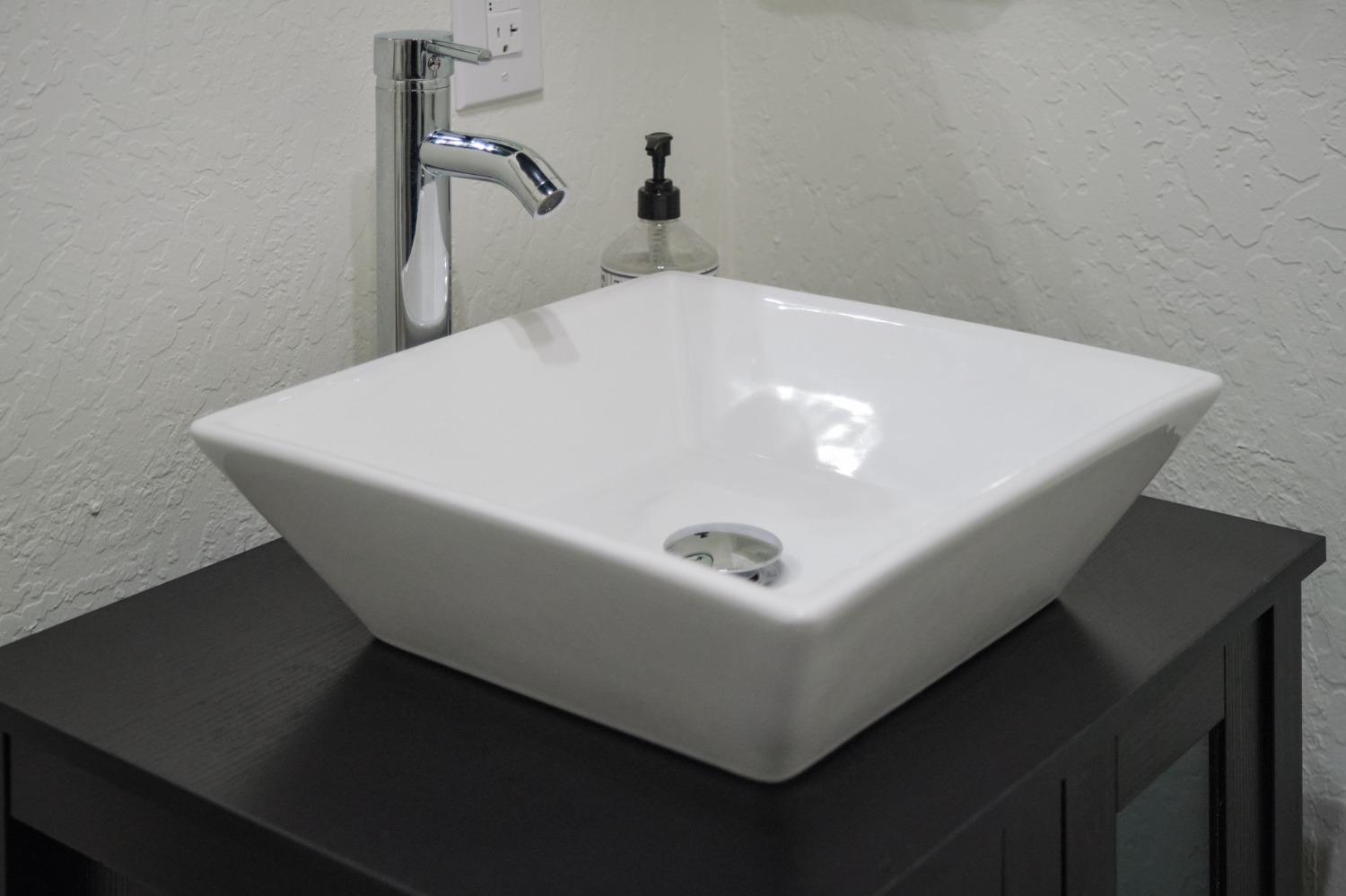 25941 Ellmaro Road Long Barn, CA 95335 - Photo 29 of 74 a white bath tub sitting in a bathroom