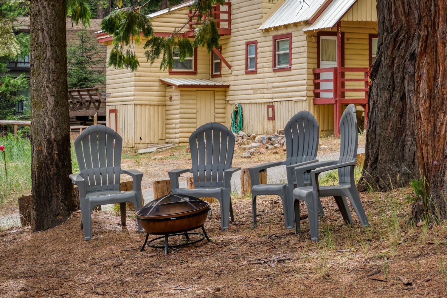 25941 Ellmaro Road Long Barn, CA 95335 - Photo 33 of 74 a backyard of a house with table and chairs