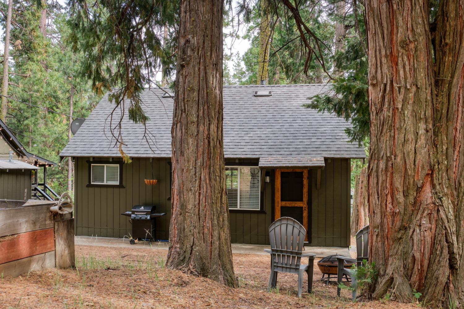 25941 Ellmaro Road Long Barn, CA 95335 - Photo 36 of 74 a house view with a outdoor space