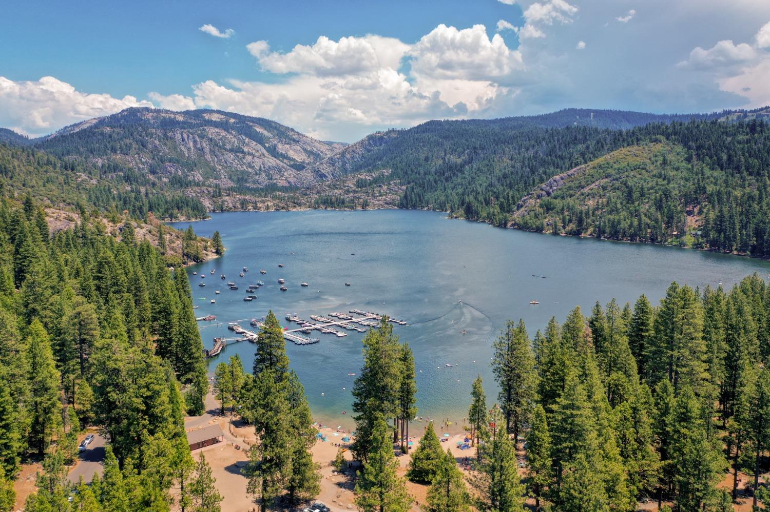 25941 Ellmaro Road Long Barn, CA 95335 - Photo 40 of 74 a view of a lake with a mountain in the background