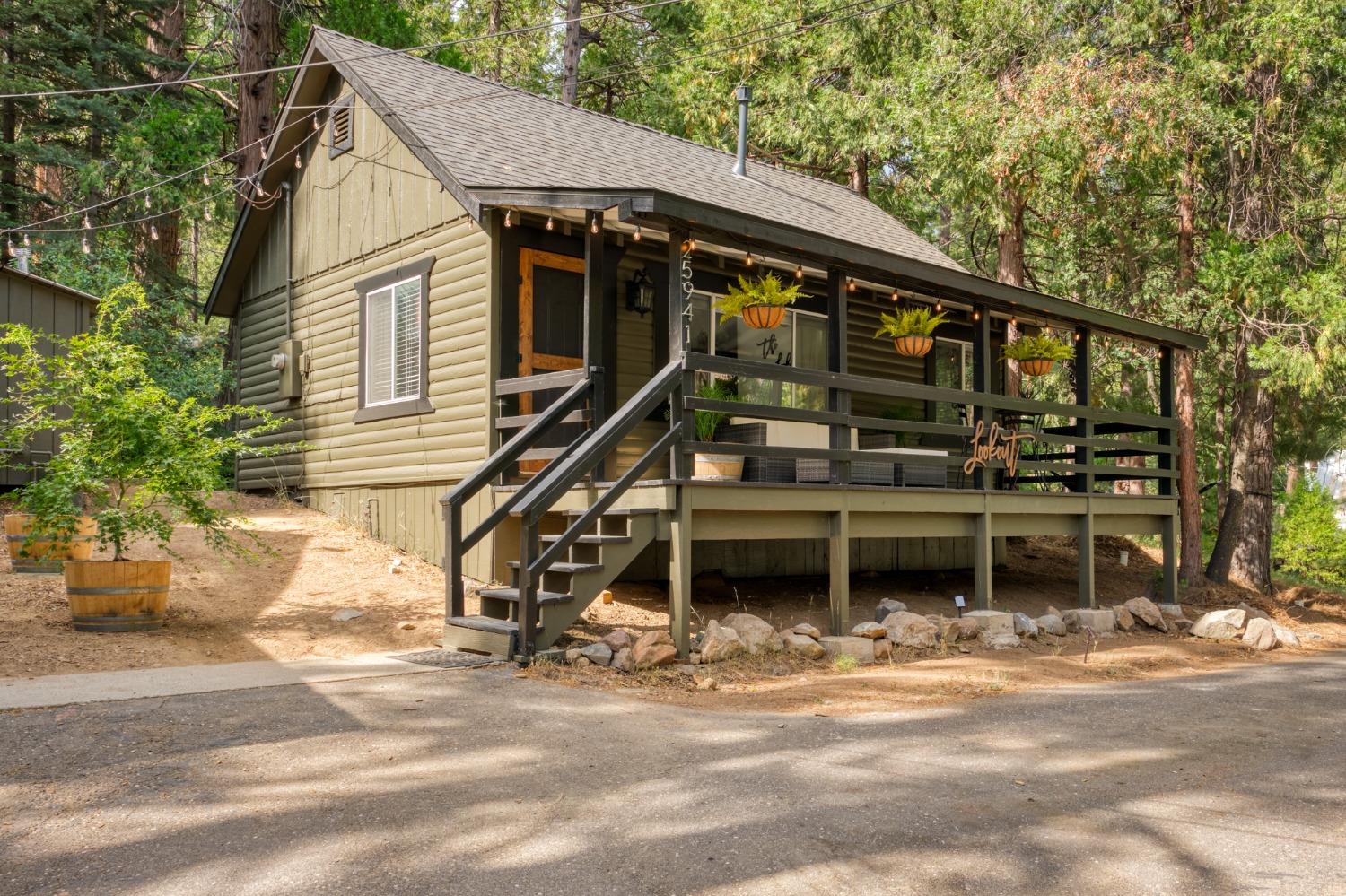 25941 Ellmaro Road Long Barn, CA 95335 - Photo 41 of 74 a front view of a house with a yard