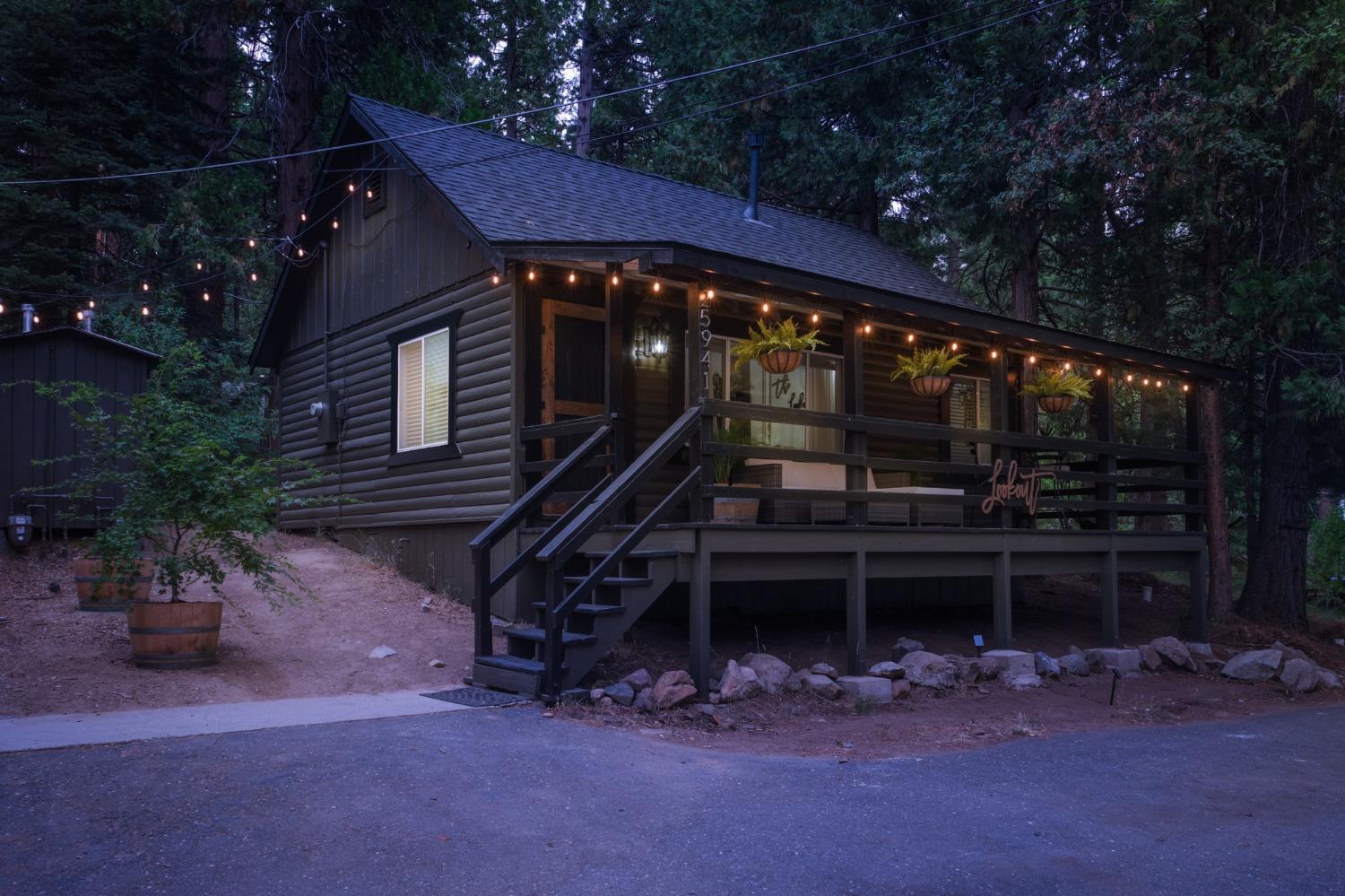 25941 Ellmaro Road Long Barn, CA 95335 - Photo 44 of 74 a view of house with deck and outdoor seating