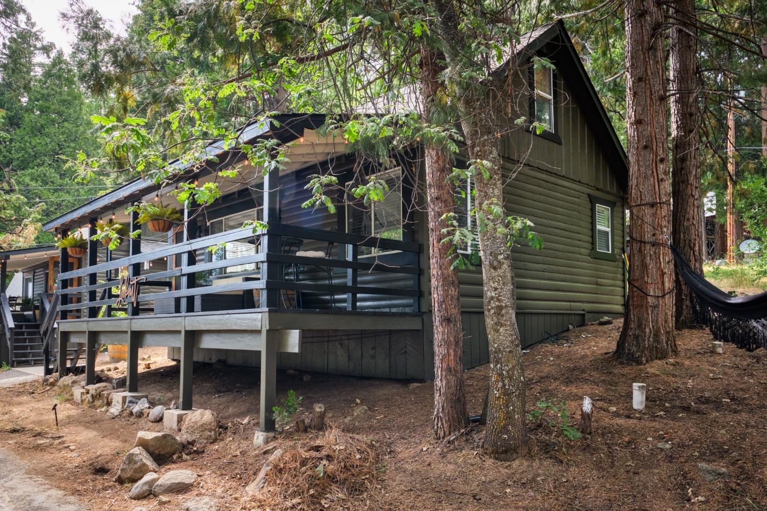25941 Ellmaro Road Long Barn, CA 95335 - Photo 45 of 74 a view of a house with a tree