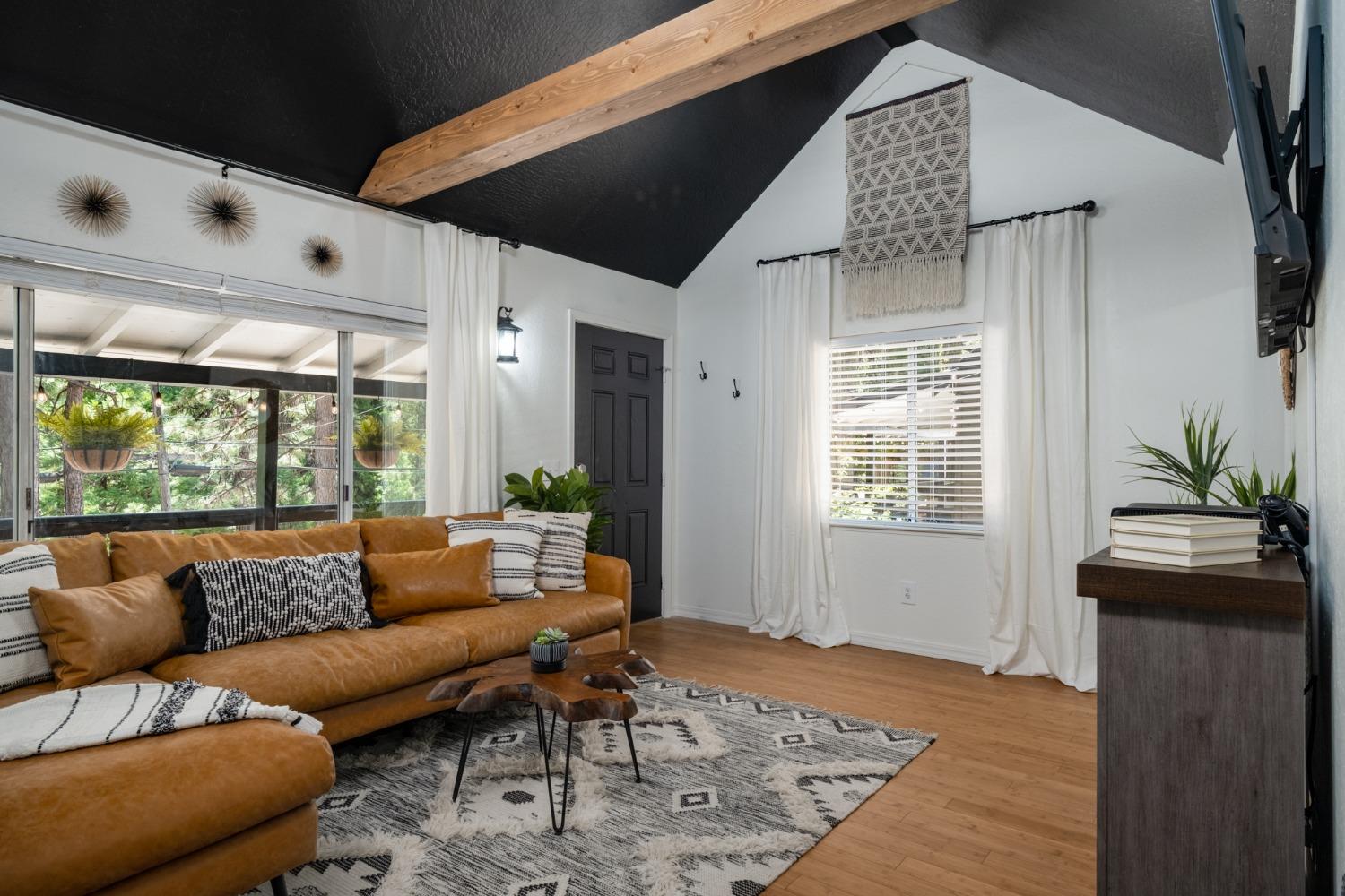 25941 Ellmaro Road Long Barn, CA 95335 - Photo 47 of 74 a living room with furniture and a large window
