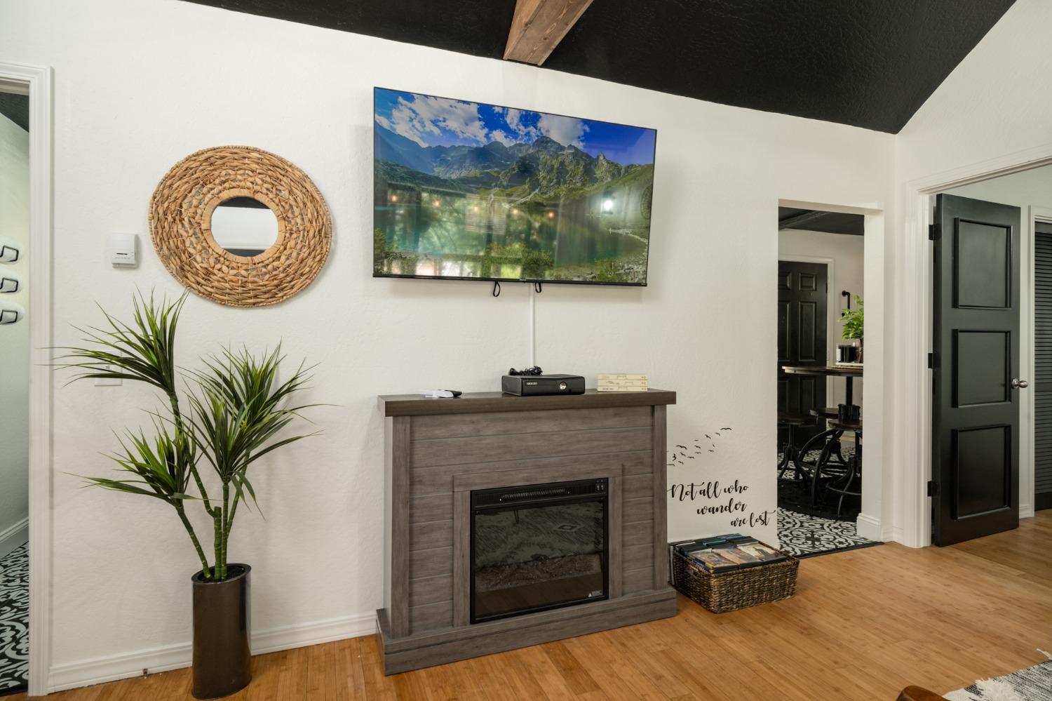 25941 Ellmaro Road Long Barn, CA 95335 - Photo 49 of 74 a living room with furniture and a fireplace