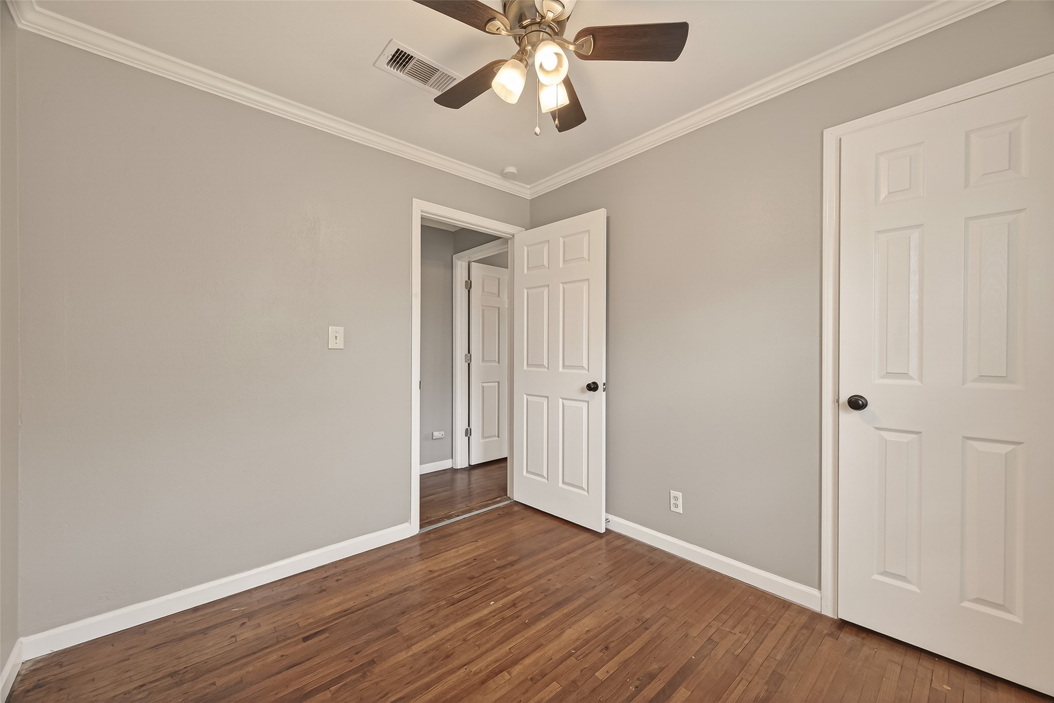 2619 Homer Street Houston, TX 77091 - Photo 14 of 23 wooden floor in an empty room