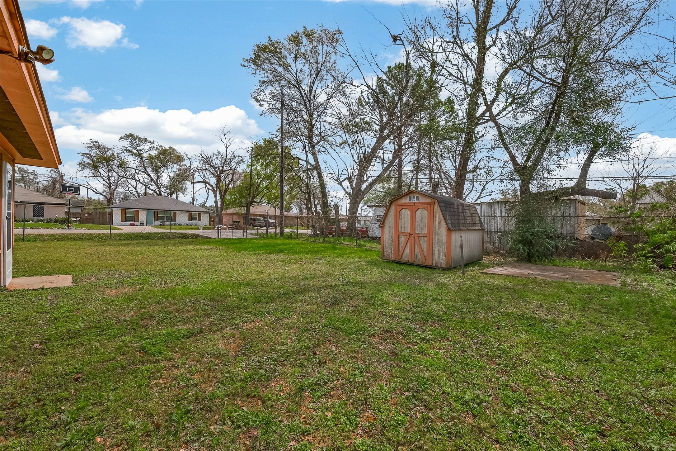 2619 Homer Street Houston, TX 77091 - Photo 19 of 23 a backyard of a house with lots of green space