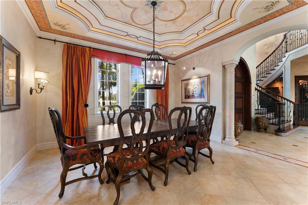 590 17th Avenue South Naples, FL 34102 - Photo 15 of 50 a view of a dining room with furniture window and outside view