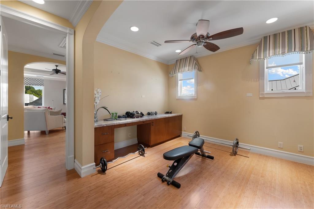 590 17th Avenue South Naples, FL 34102 - Photo 39 of 50 a view of a room with gym equipment
