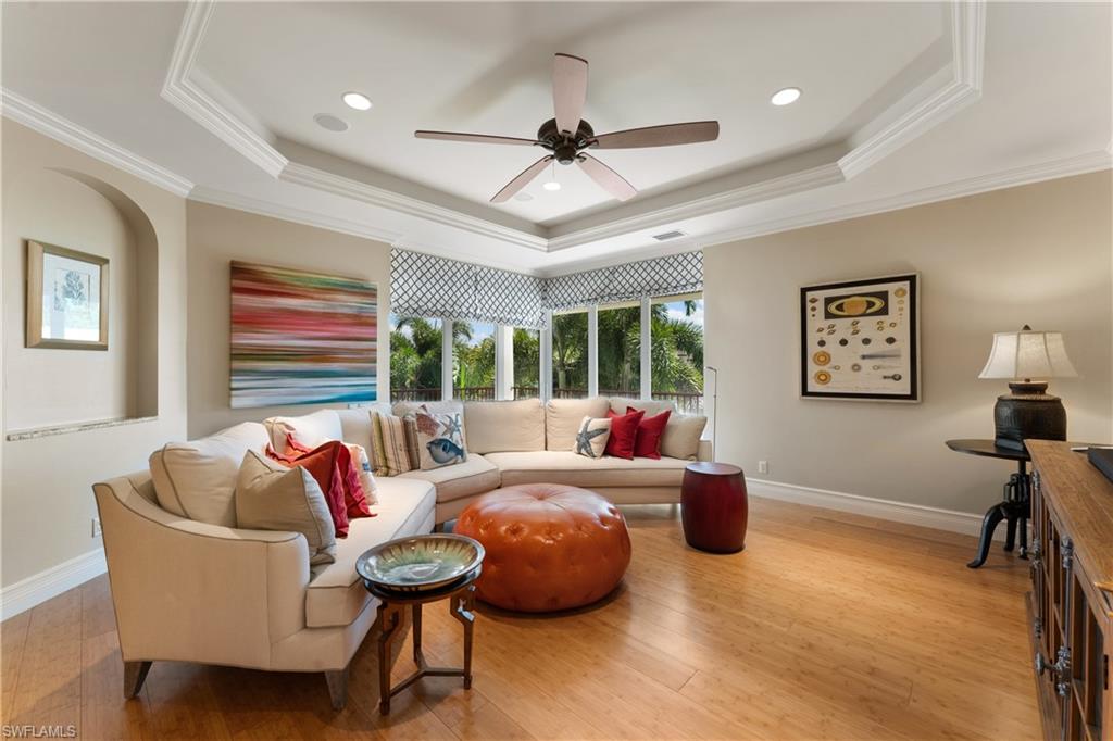 590 17th Avenue South Naples, FL 34102 - Photo 43 of 50 a living room with furniture and a large window