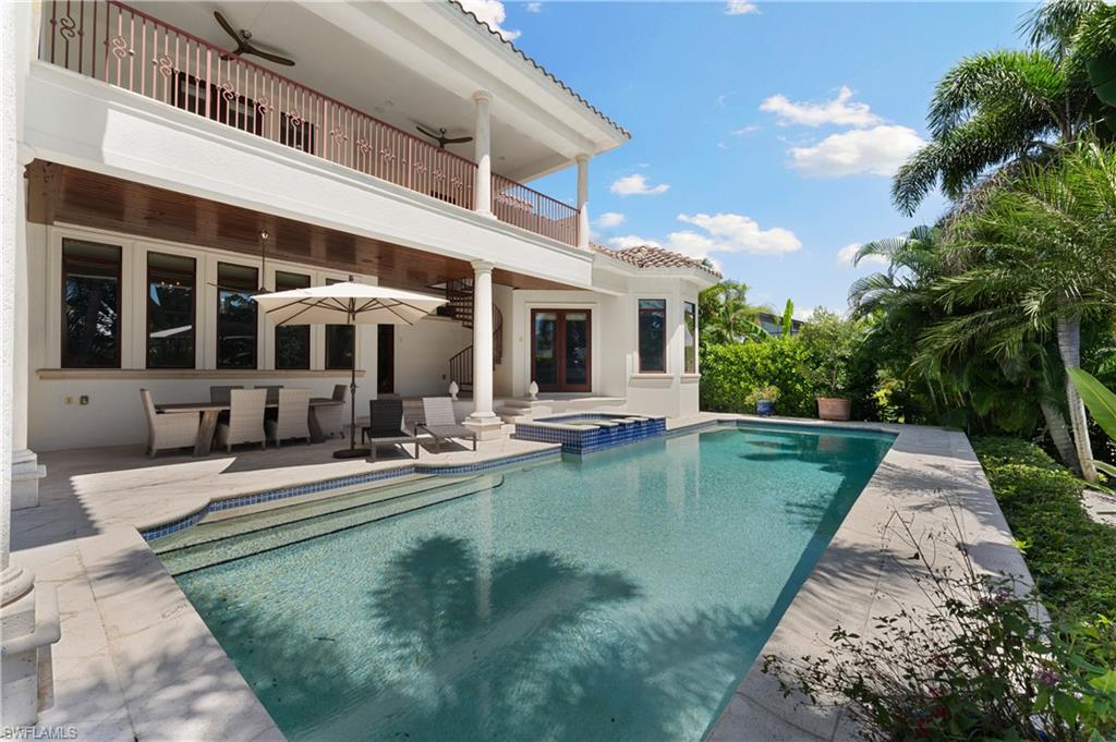 590 17th Avenue South Naples, FL 34102 - Photo 46 of 50 front view of a house with a yard