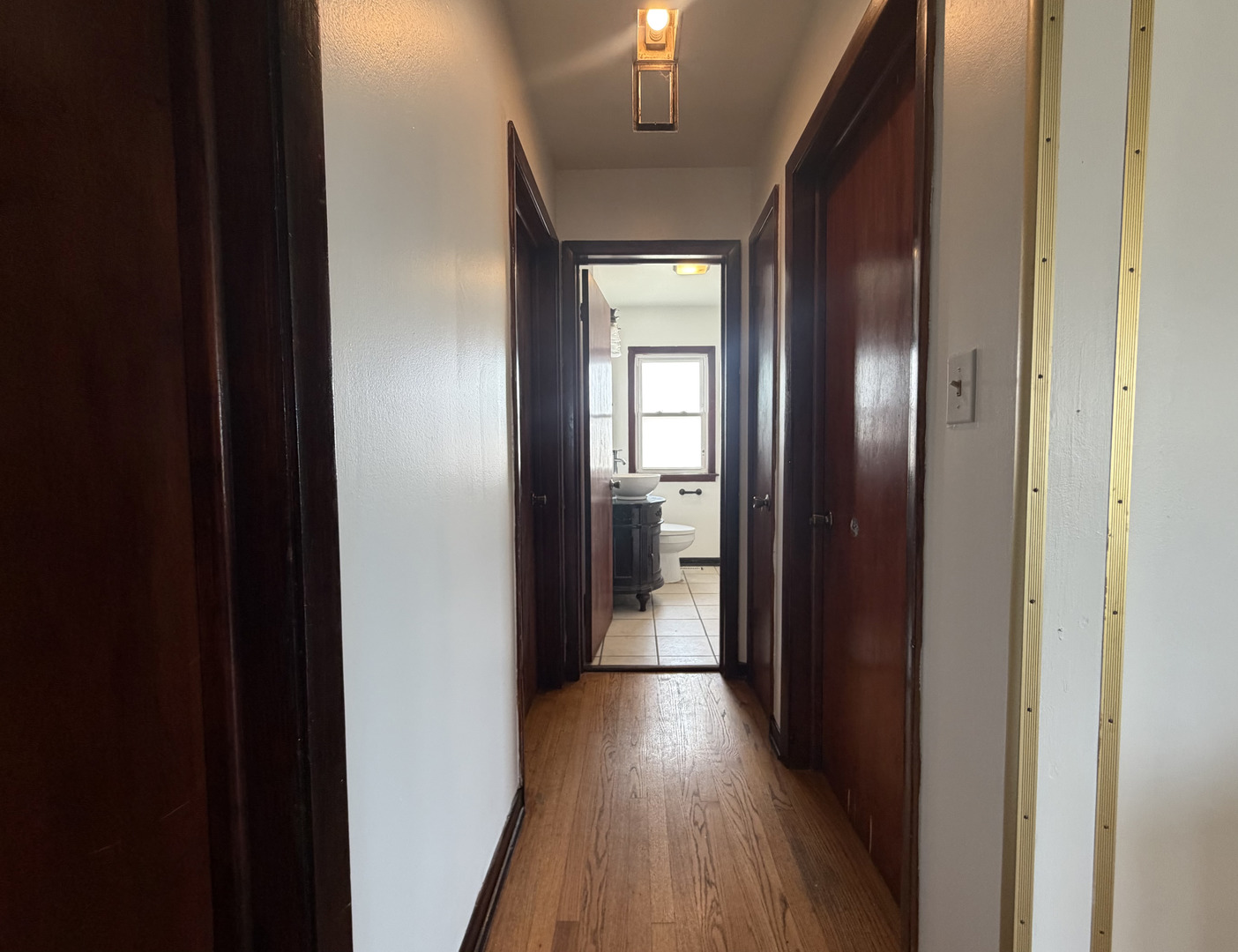 128 North York Road Bensenville, IL 60106 - Photo 12 of 39 a view of a hallway with wooden floor