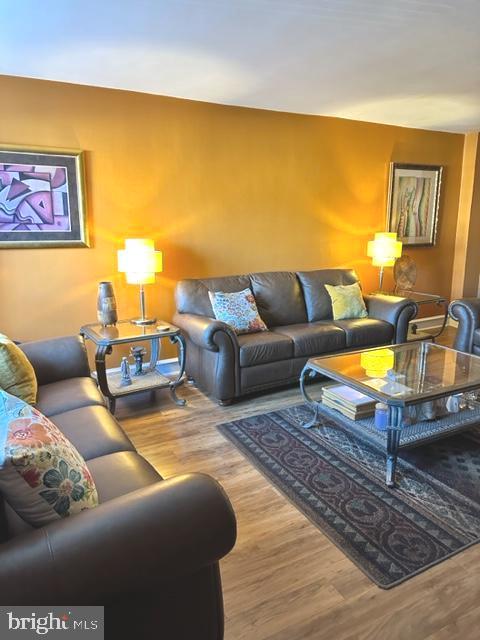 7124 Forrest Avenue Philadelphia, PA 19138 - Photo 13 of 51 a living room with a couch and dresser
