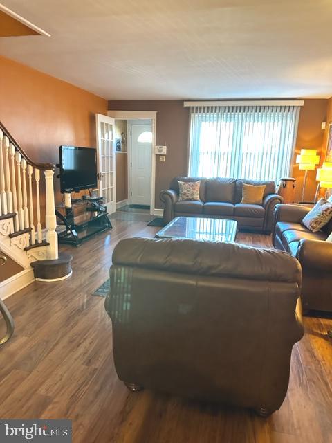 7124 Forrest Avenue Philadelphia, PA 19138 - Photo 16 of 51 a living room with furniture and a large window