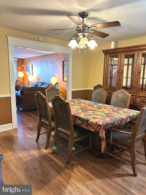 7124 Forrest Avenue Philadelphia, PA 19138 - Photo 19 of 51 a view of a dining room with furniture a chandelier and wooden floor