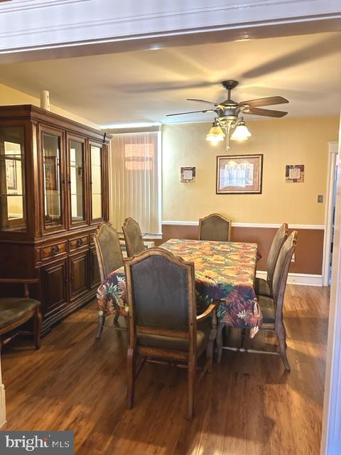 7124 Forrest Avenue Philadelphia, PA 19138 - Photo 21 of 51 a view of a dining room with furniture a chandelier and wooden floor