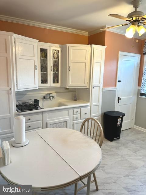 7124 Forrest Avenue Philadelphia, PA 19138 - Photo 24 of 51 a kitchen with a stove a sink and a refrigerator