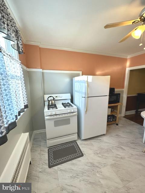 7124 Forrest Avenue Philadelphia, PA 19138 - Photo 28 of 51 a white refrigerator freezer sitting inside of a kitchen