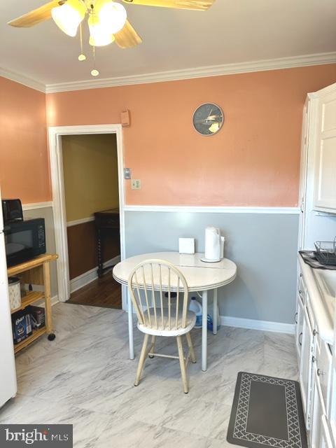 7124 Forrest Avenue Philadelphia, PA 19138 - Photo 29 of 51 a view of a dining room with furniture and a rug