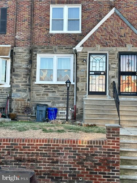 7124 Forrest Avenue Philadelphia, PA 19138 - Photo 3 of 51 a front view of a house with large windows