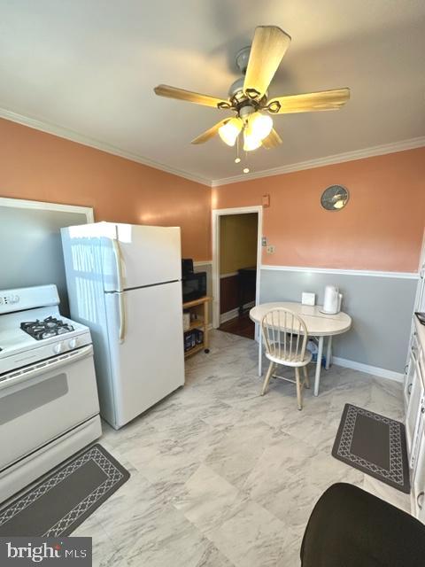 7124 Forrest Avenue Philadelphia, PA 19138 - Photo 31 of 51 a kitchen with stainless steel appliances granite countertop a dining table and chairs