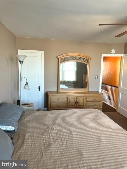 7124 Forrest Avenue Philadelphia, PA 19138 - Photo 32 of 51 a bedroom with a large bed and a large mirror