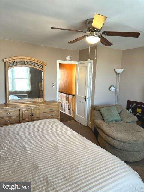 7124 Forrest Avenue Philadelphia, PA 19138 - Photo 34 of 51 a bedroom with a bed and a mirror on the dresser