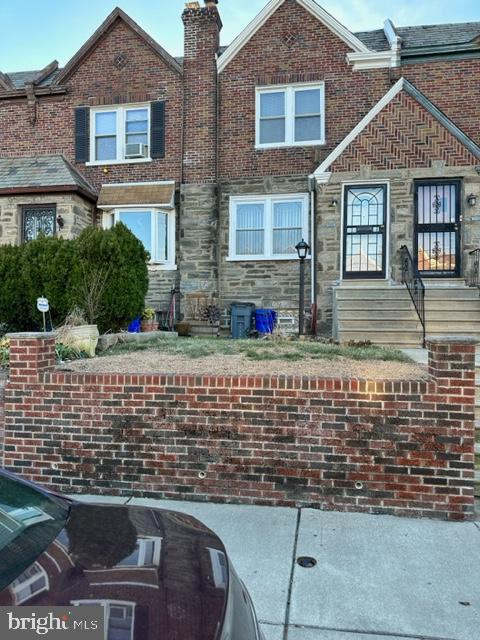 7124 Forrest Avenue Philadelphia, PA 19138 - Photo 4 of 51 a front view of a house with glass windows