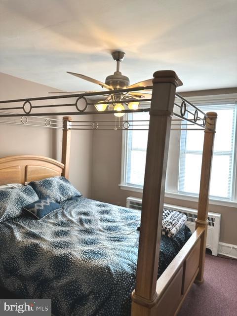 7124 Forrest Avenue Philadelphia, PA 19138 - Photo 41 of 51 a bedroom with a bed and wooden floor