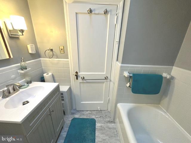 7124 Forrest Avenue Philadelphia, PA 19138 - Photo 46 of 51 a bathroom with a sink a toilet and shower