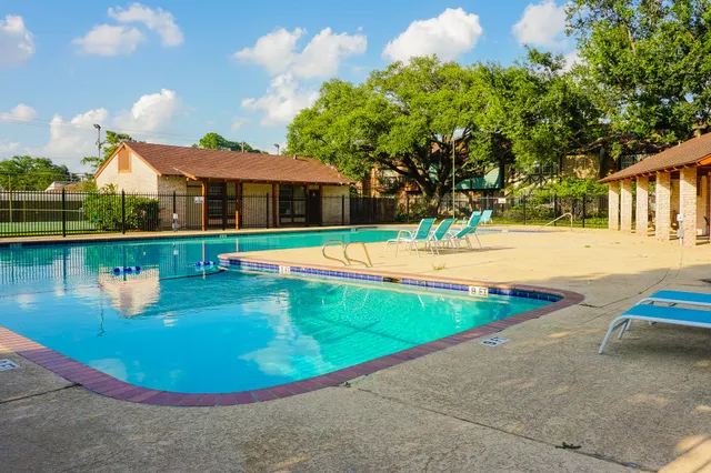 a view of a house with swimming pool