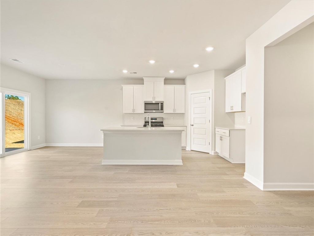 110 Blooming Meadow Road Piedmont, SC 29673 - Photo 2 of 11 Photo is not of the actual home, but is an inspirational photo of builder’s model home and may depict options, furnishings, and/or decorator features that are not included