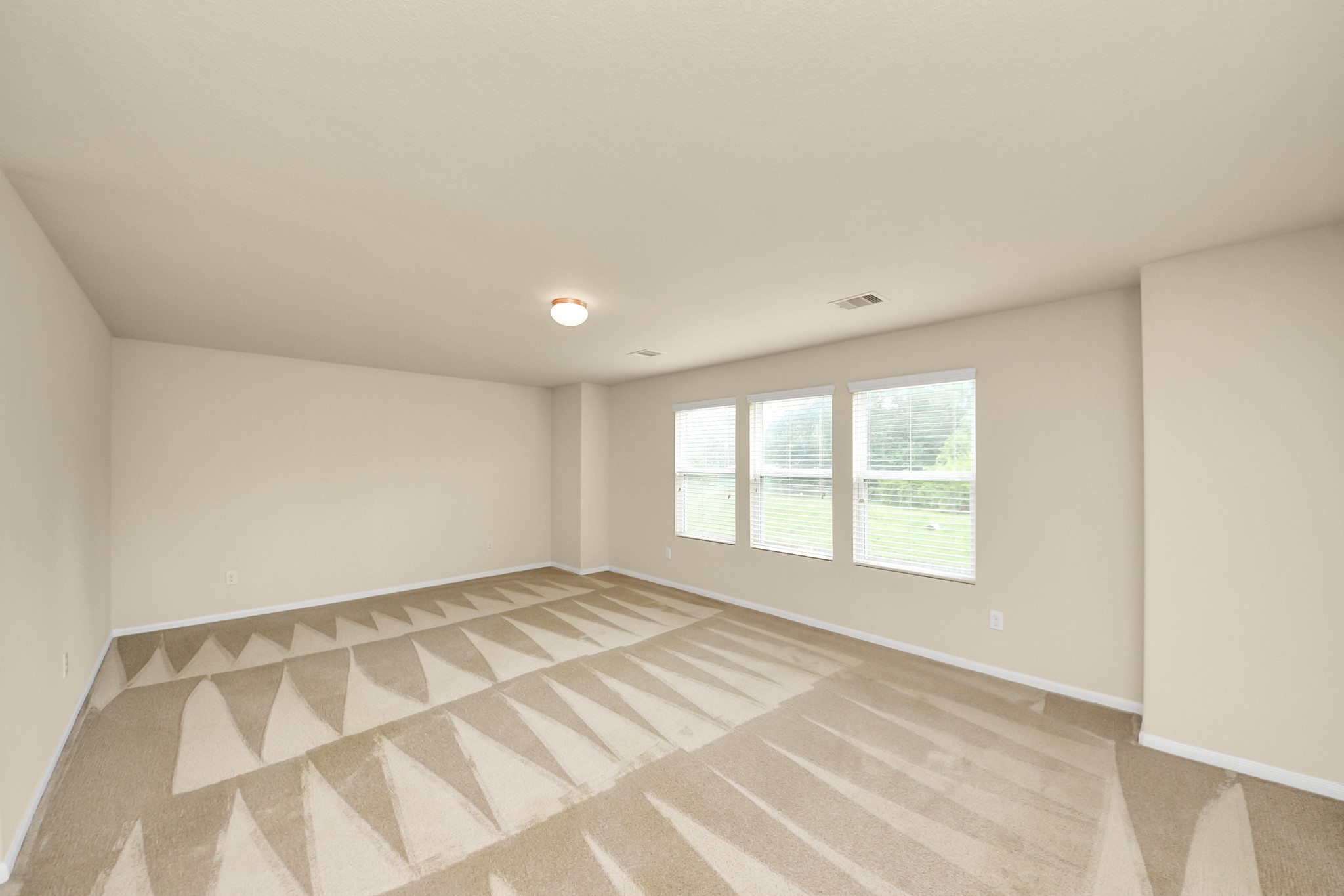 15623 Sheldon Ridge Way Houston, TX 77044 - Photo 18 of 36 a view of an empty room with a window